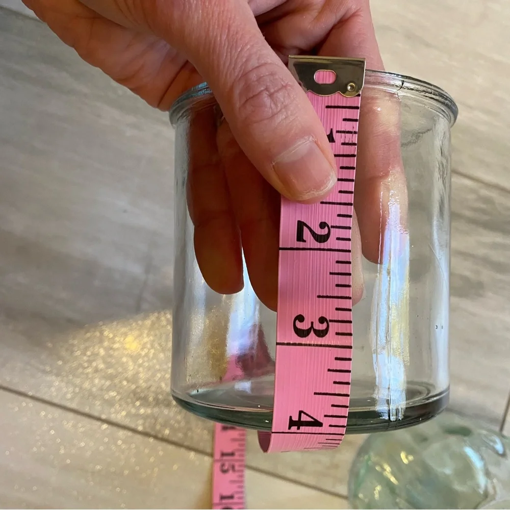 Bundle of Clear Round and Light Green Circular Textured Glass Vases
